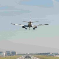 London City Airport, a plane above the runway