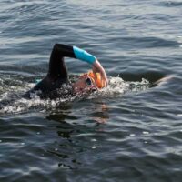 London Royal Docks Open Water Swimming, a swimmer in the water