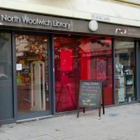 North woolwich library entrance with a sign advertising film nights